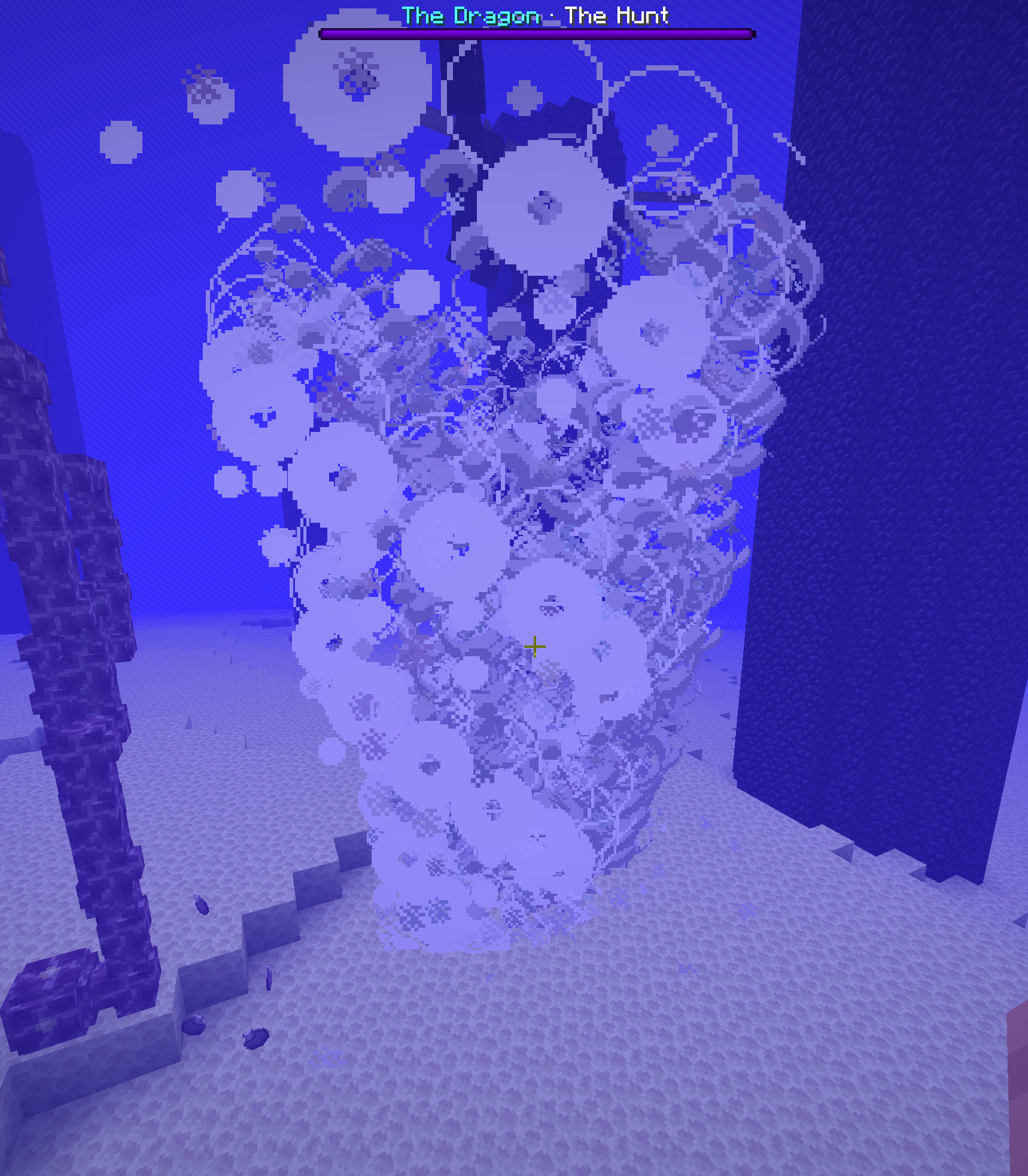 A tall spinning tornado funnel on the island pulling a player up its column